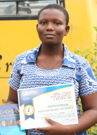 Emelia With Her Bible And Certificate