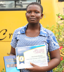 Emelia With Her Bible And Certificate
